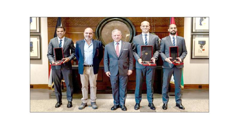الملك ينعم على طاقم التحكيم الأردني المشارك في كأس العالم بوسام التميز