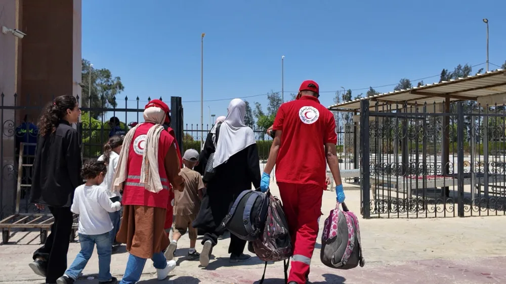 معبر رفح يستقبل الدفعة الـ75 من العائدين الفلسطينيين لغزة